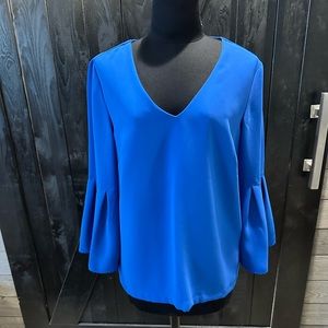 H&M women’s bell, sleeved blouse, size 8. In great condition.